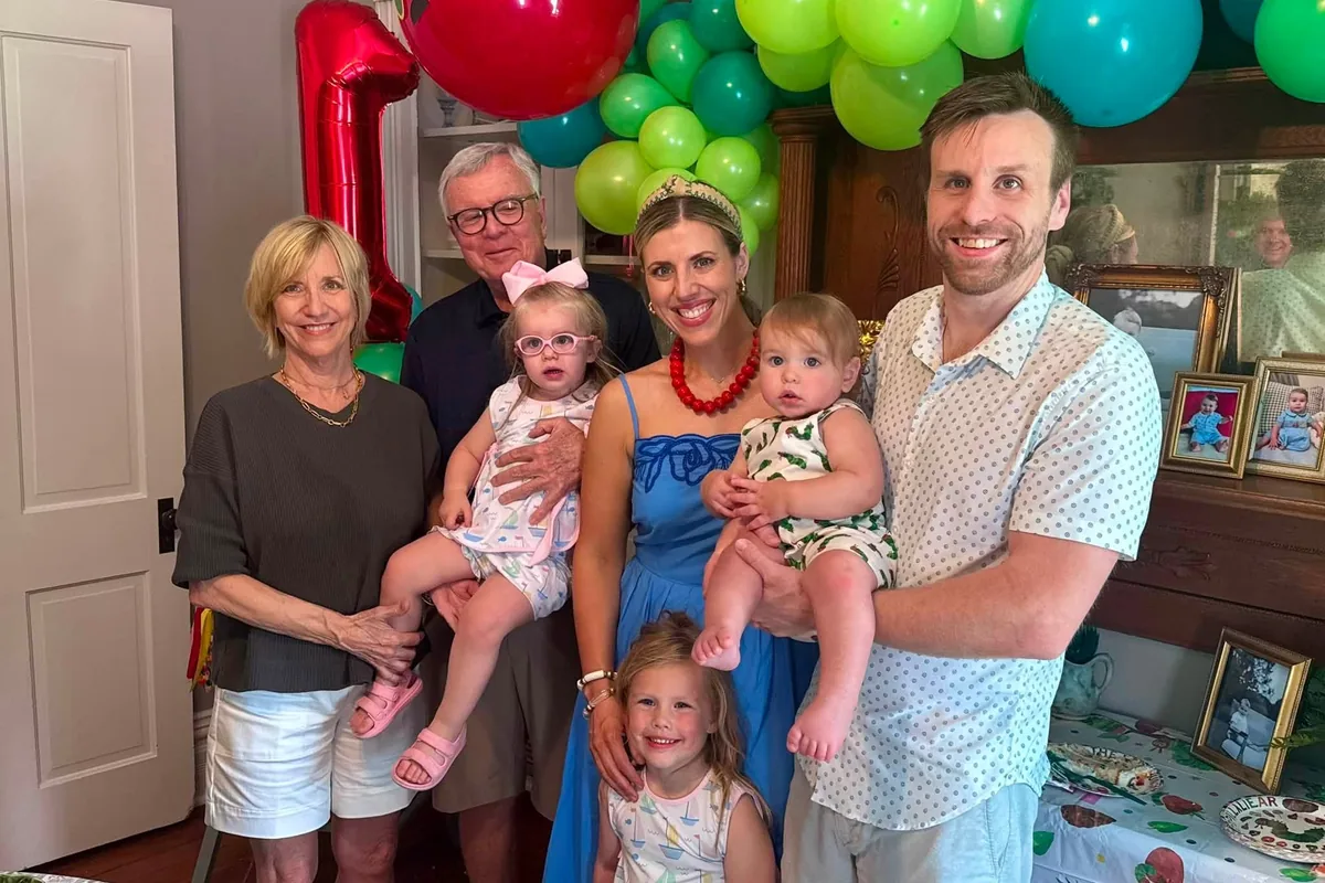 Mark's extended family gathered at home for a first birthday celebration